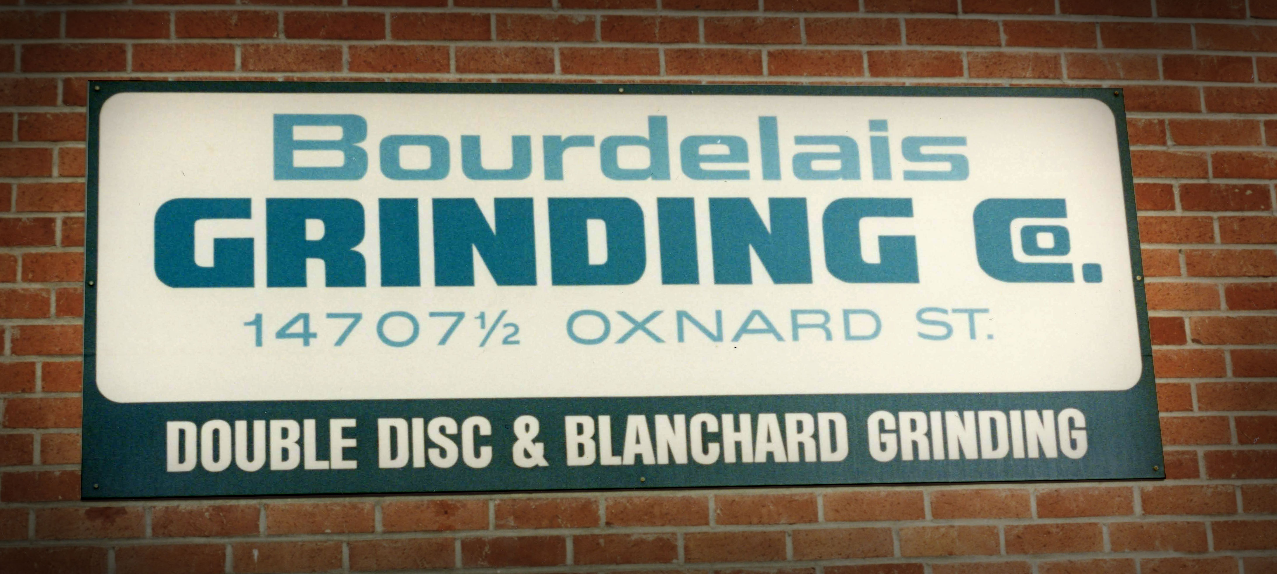 old grinding sign